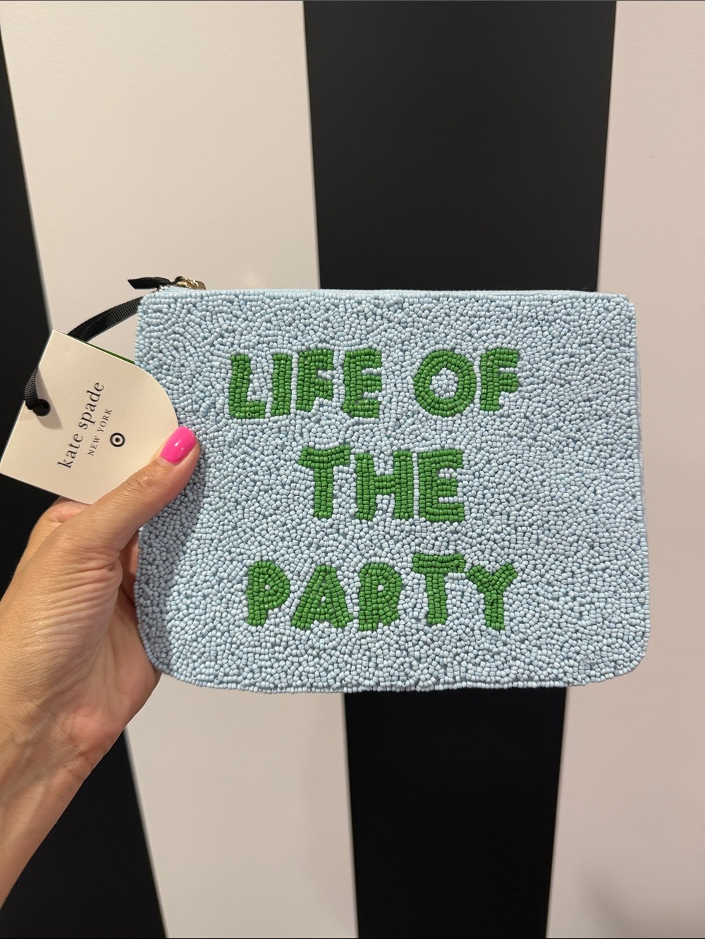 kate spade light blue beaded pouch with green lettering